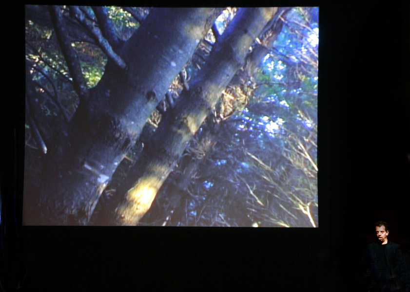 Nicholas Isherwood Performing David Felders Work Shemayin In Front Of The Projection Of Film By Elliot Caplan  6